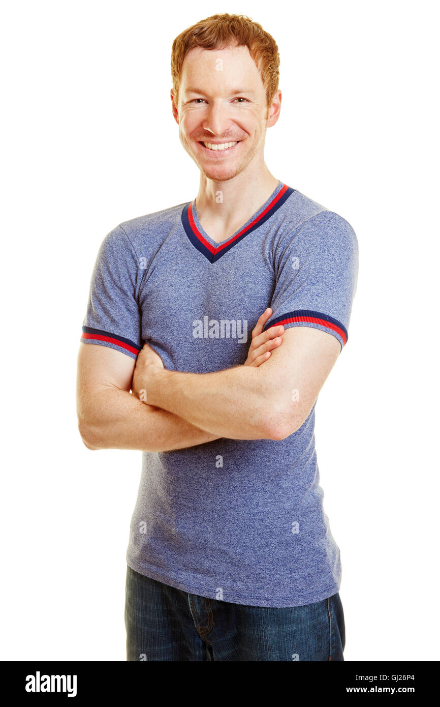 L'uomo come un allenatore di fitness contenuto sorridente con le braccia incrociate Foto Stock