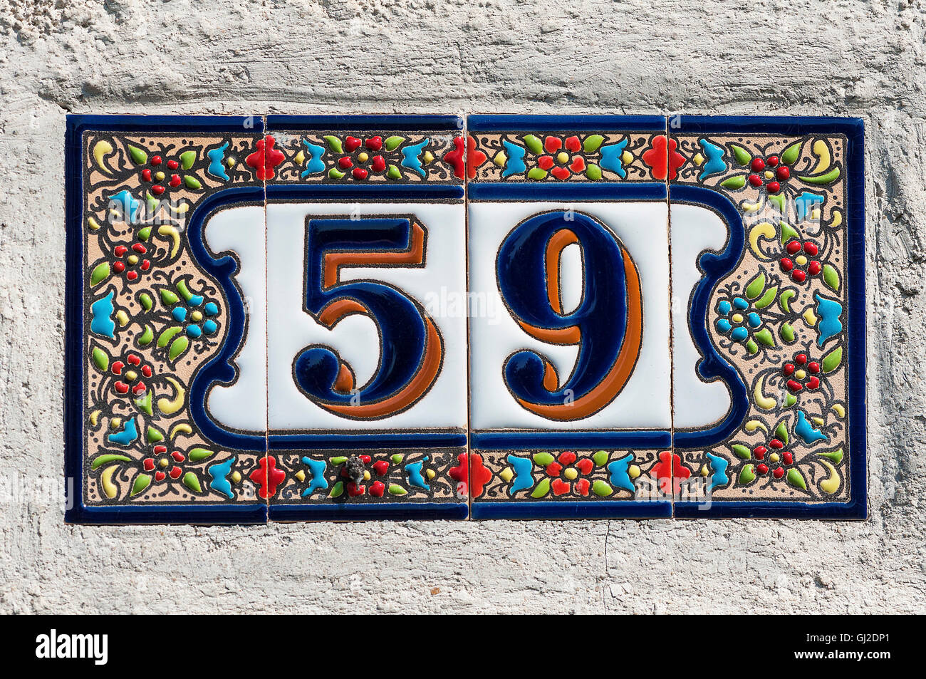 Numero 59. Numero civico. Indirizzo. Piastra su una parete Foto Stock