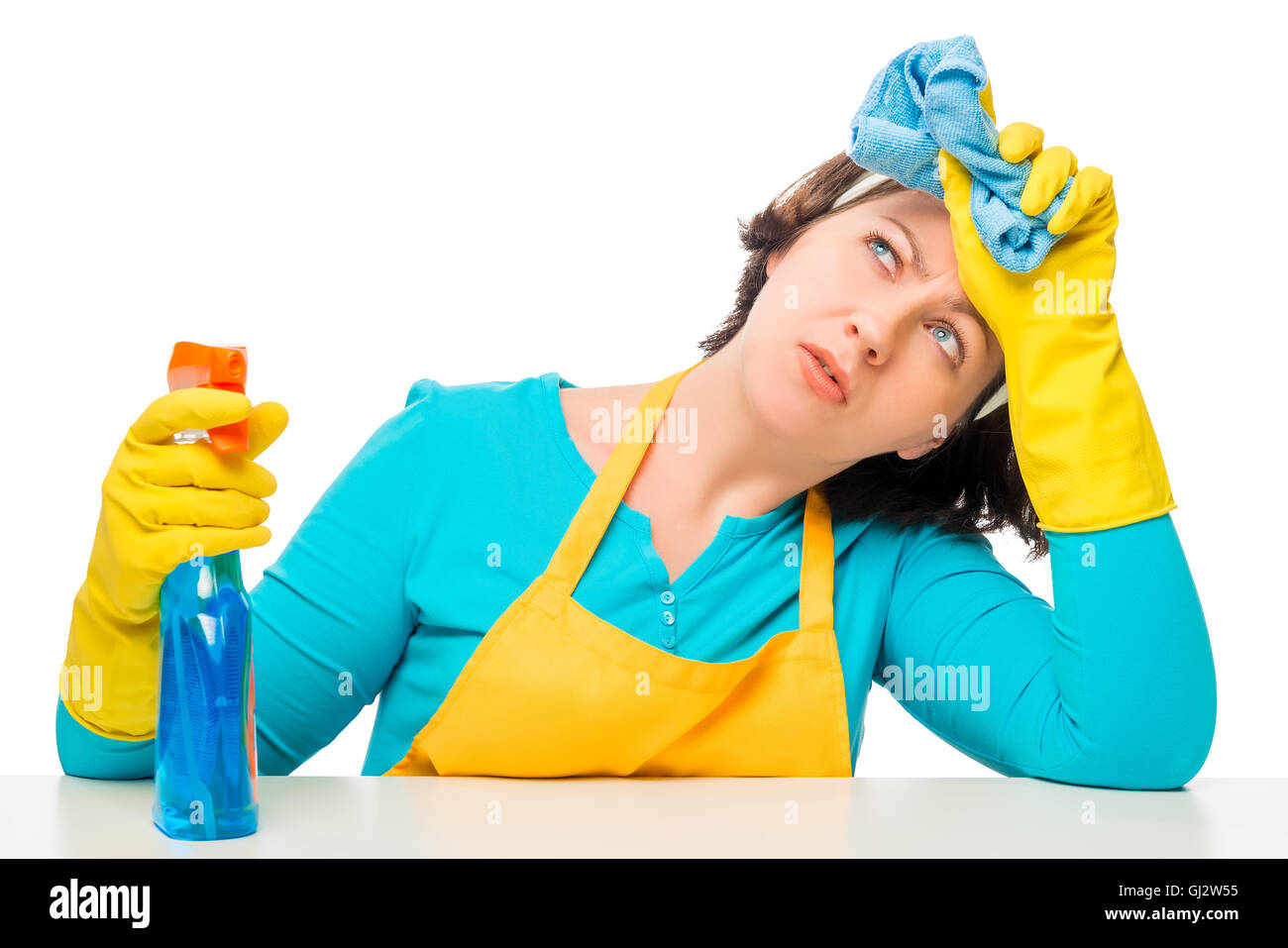 Ritratto di stanchi del lavoro domestico casalinga su sfondo bianco Foto Stock