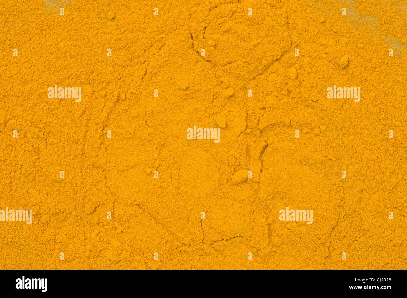 Essiccata la curcuma spice texture di sfondo Foto Stock