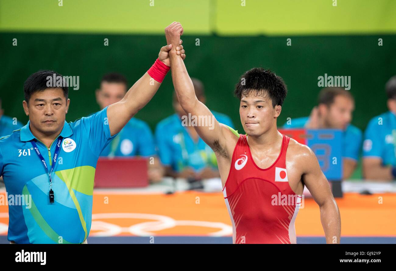 Rio de Janeiro, Brasile. 14 Ago, 2016. Shinobu Ota (JPN) Wrestling : Shinobu Ota del Giappone festeggia dopo aver vinto contro Hamid Mohammad Soryan dell'Iran nel corso del Rio 2016 Giochi Olimpici uomini Greco-romane 59kg qualifica a Olympic Training Center Hall 3 a Rio de Janeiro in Brasile . Credito: Enrico Calderoni AFLO/sport/Alamy Live News Foto Stock