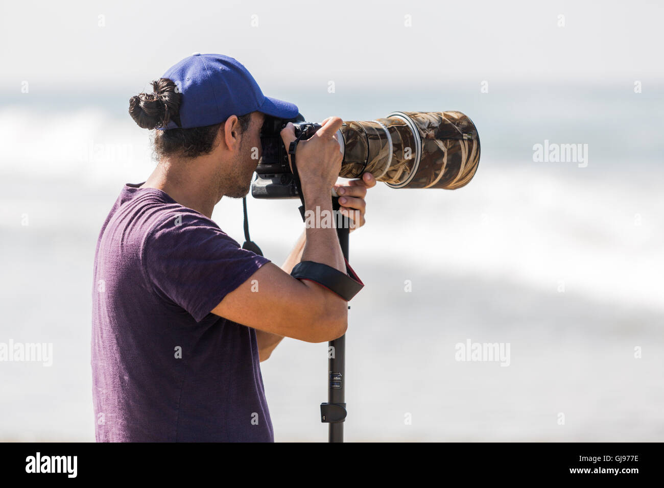 Fotografo sulla spiaggia all'US open di surf a Huntington Beach, California, 27 Luglio 2016 Foto Stock