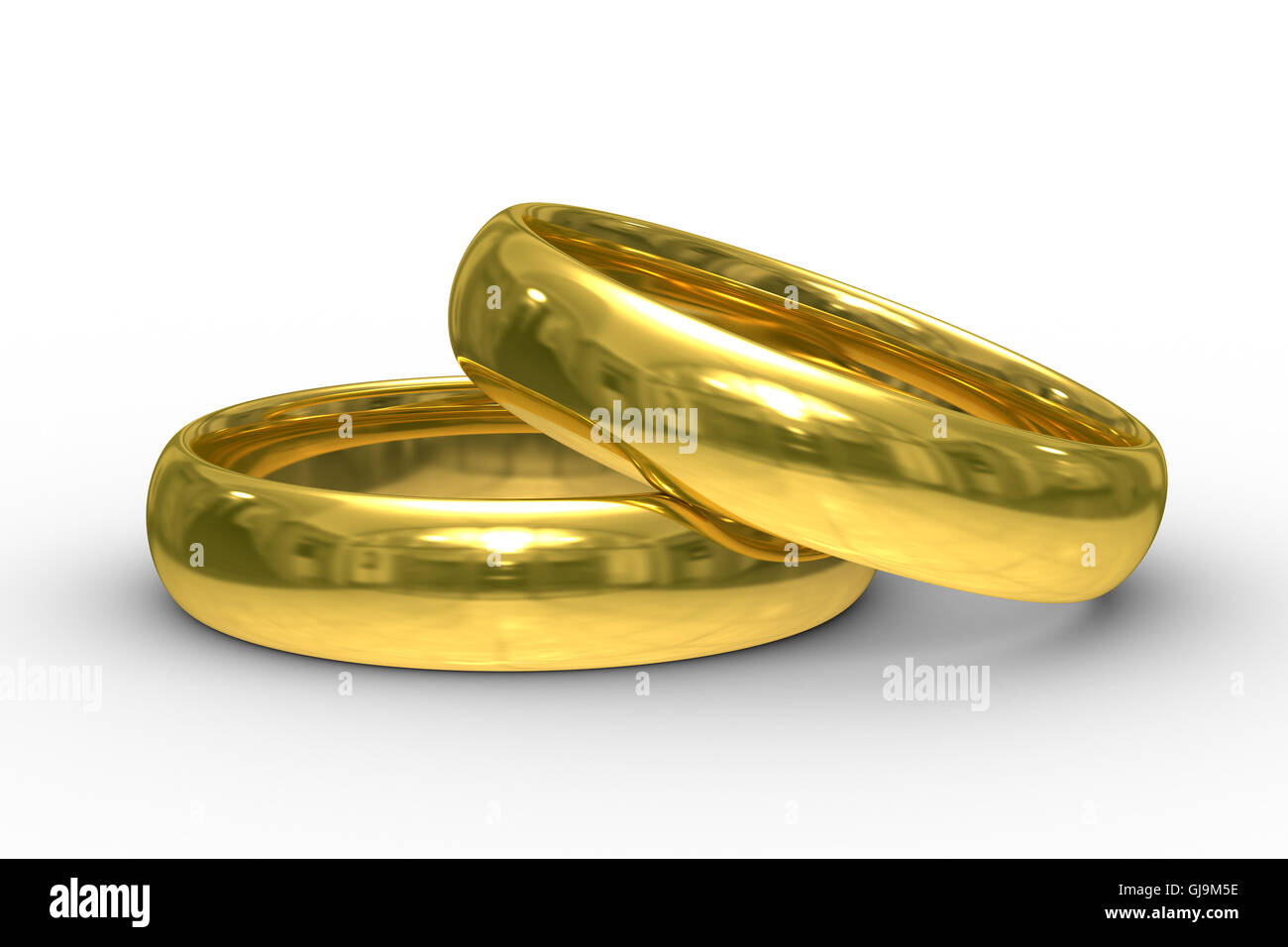 Oro due anelli di nozze. Isolato immagine 3D Foto Stock