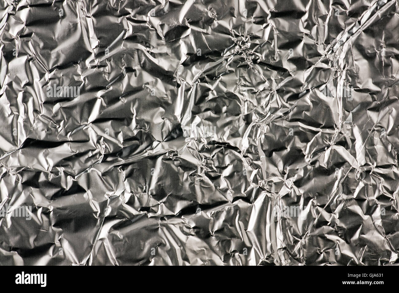 Alluminio stropicciato cucina lamina sfondo Foto Stock