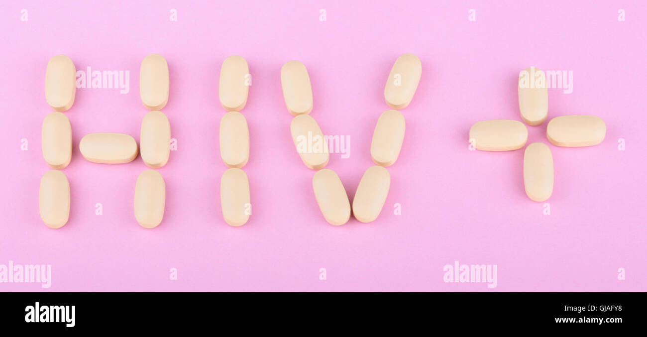 La terapia dell'hiv efavirenz su sfondo rosa Foto Stock