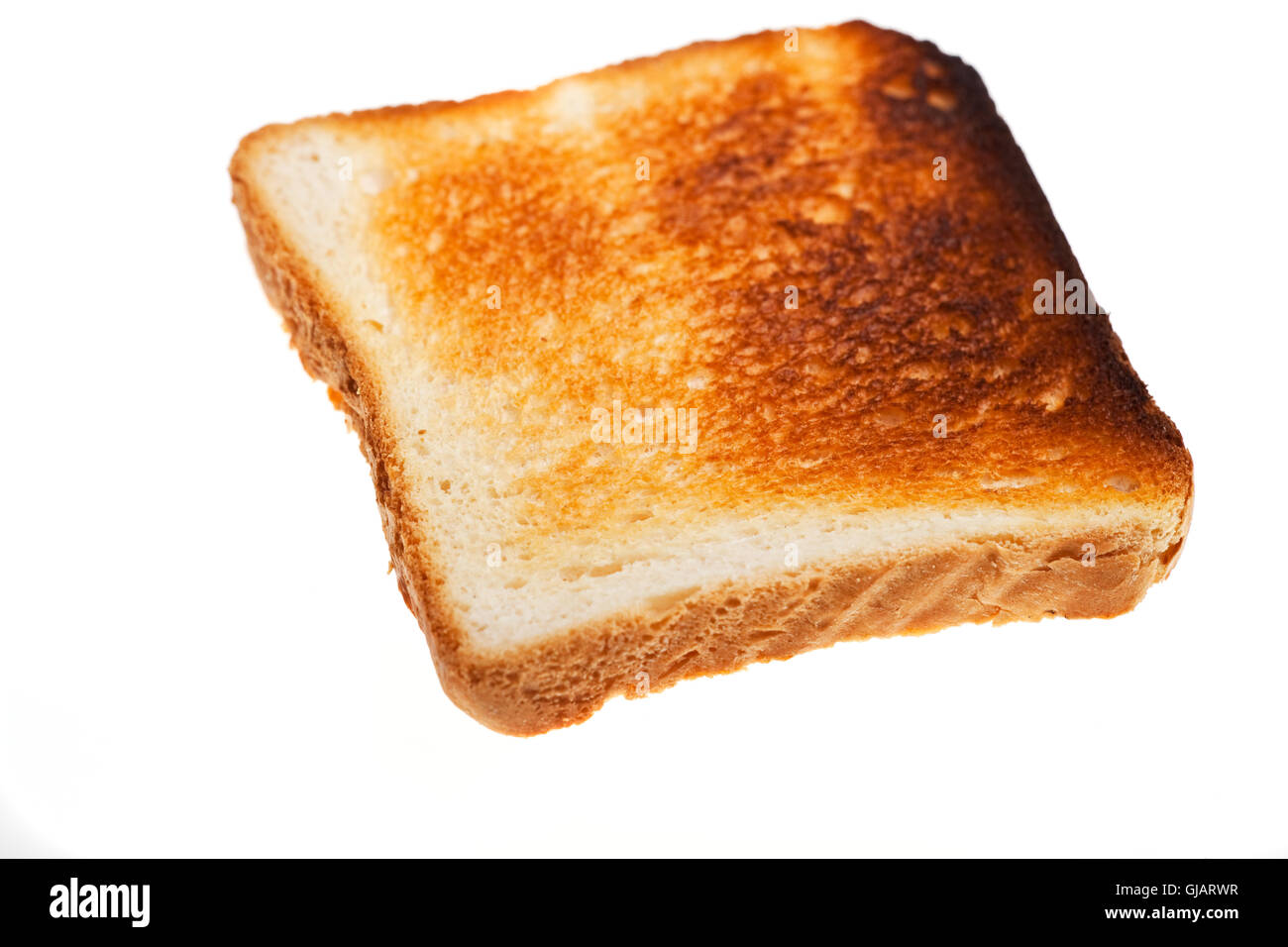 Fetta di pane tostato isolato su bianco Foto Stock