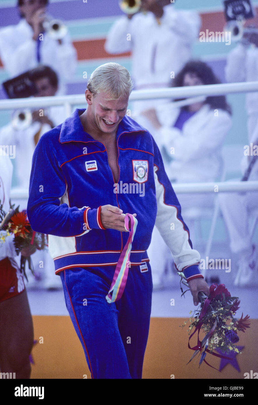 California - Los Angeles - 1984 giochi olimpici estivi. Stati Uniti d'America uomini nuoto. Steve Lundquist, 100m a rana, medaglia d'oro, NWR Foto Stock