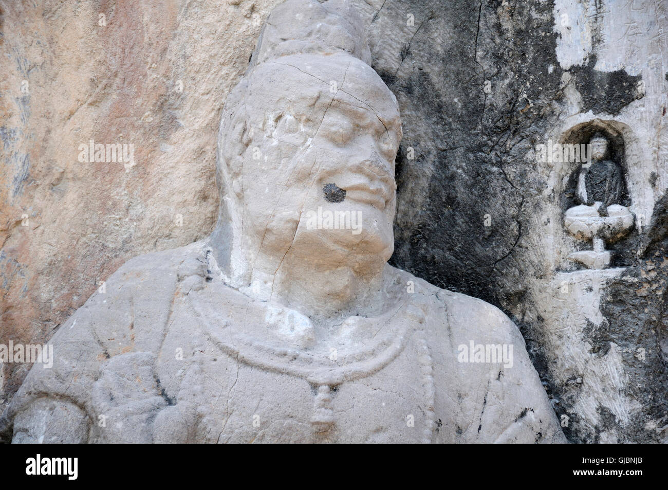 Antica Buddha e dio buddista sculture e grotte con le Grotte di Longmen a Luoyang Cina nella Provincia di Henan. Foto Stock