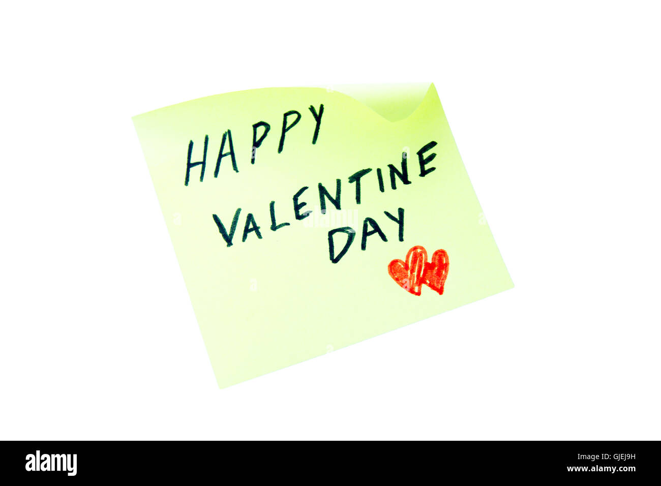 Post-it con la parola felice il giorno di san valentino su uno sfondo bianco visto dalla parte anteriore Foto Stock