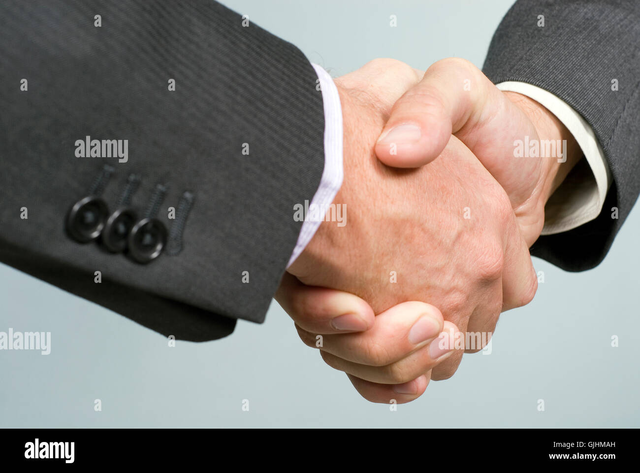 stretta di mano Foto Stock