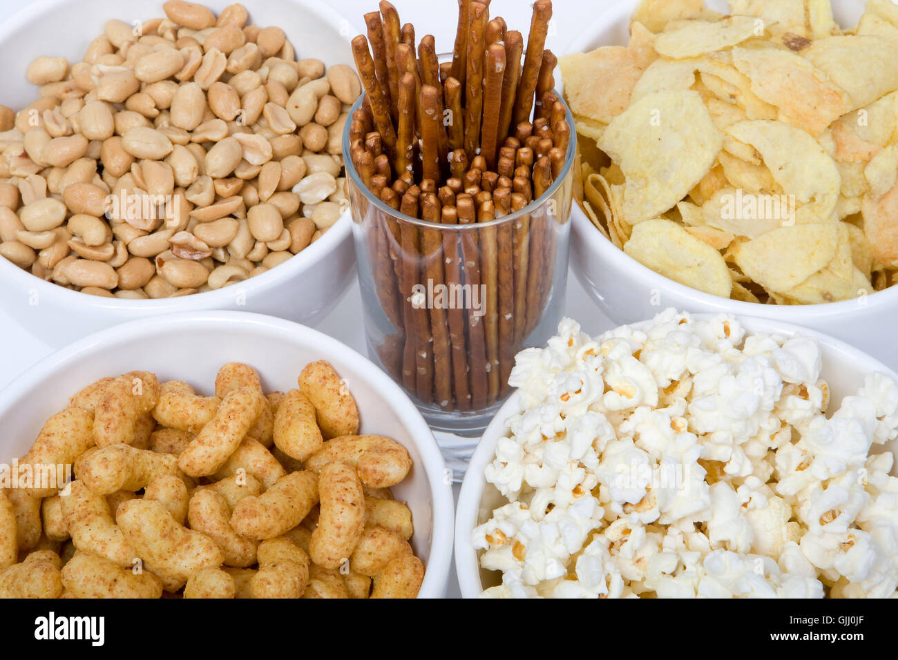 Il taglio del pop corn chips Foto Stock