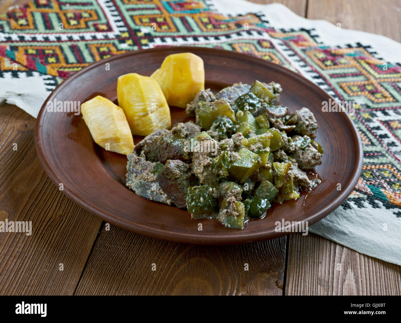 Fegato stile russo con cime di rapa cotto a vapore Foto Stock