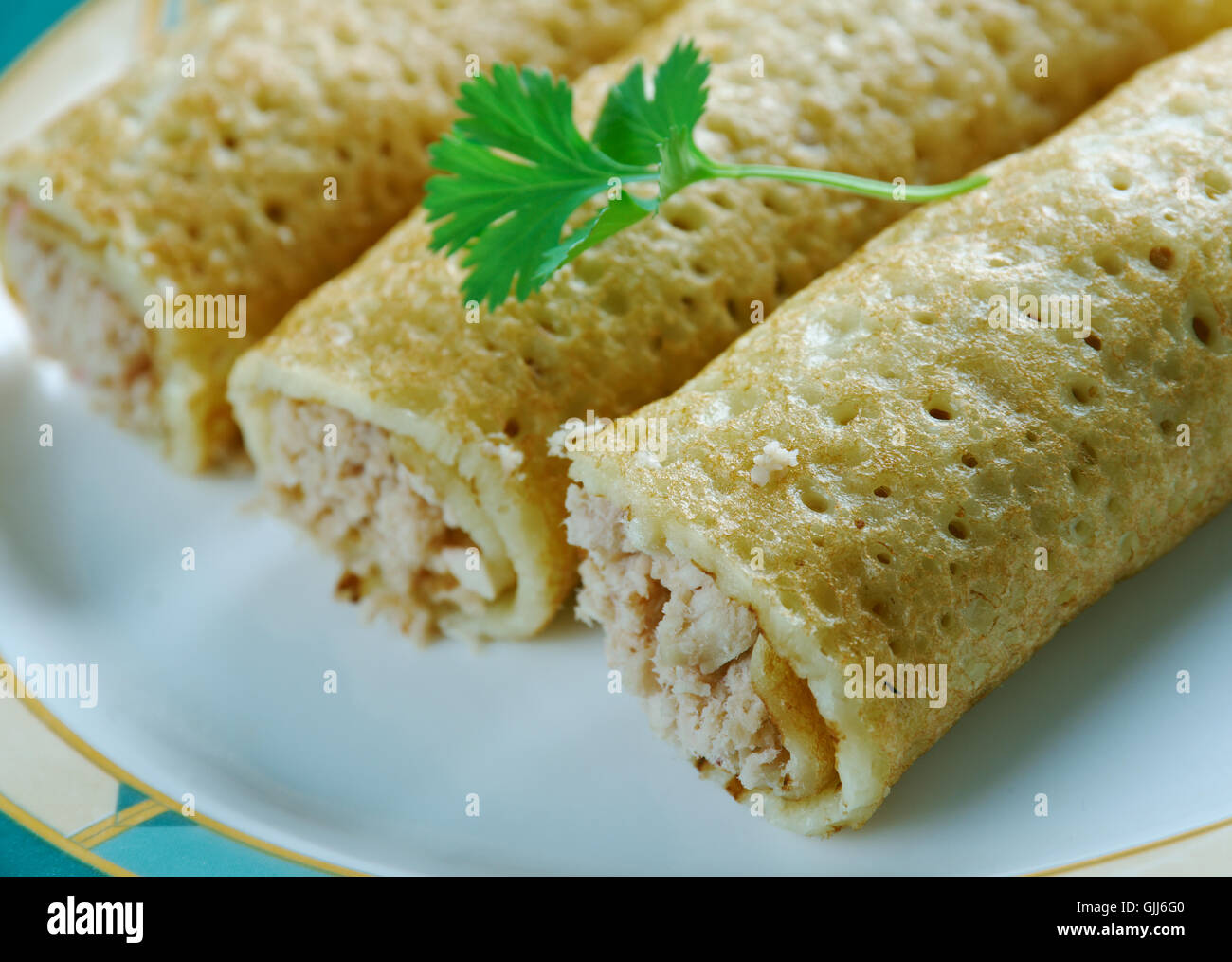 Il pollo al forno Taquitos Foto Stock