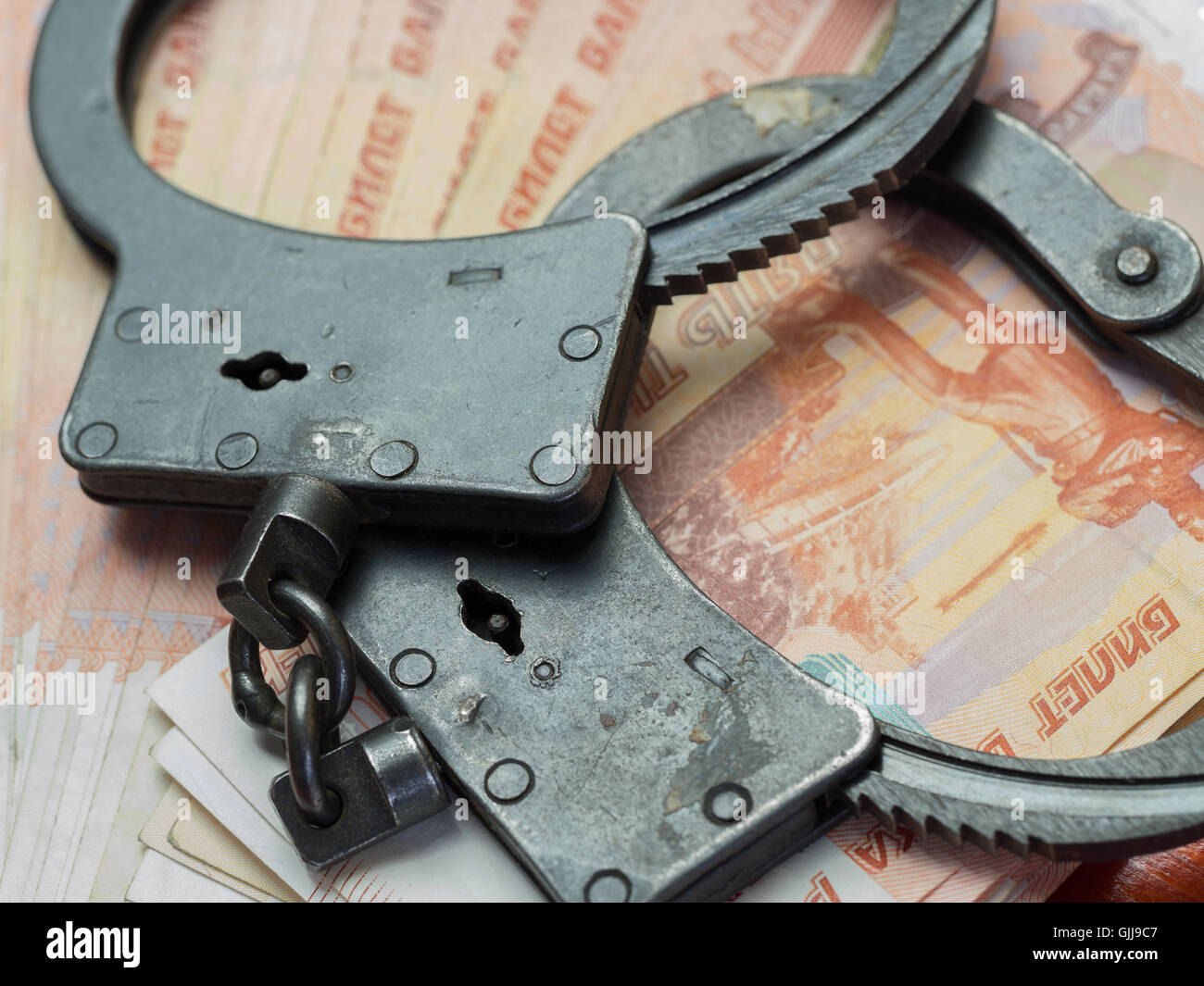 Manette,e denaro.La nozione di Delitto e castigo. Foto Stock