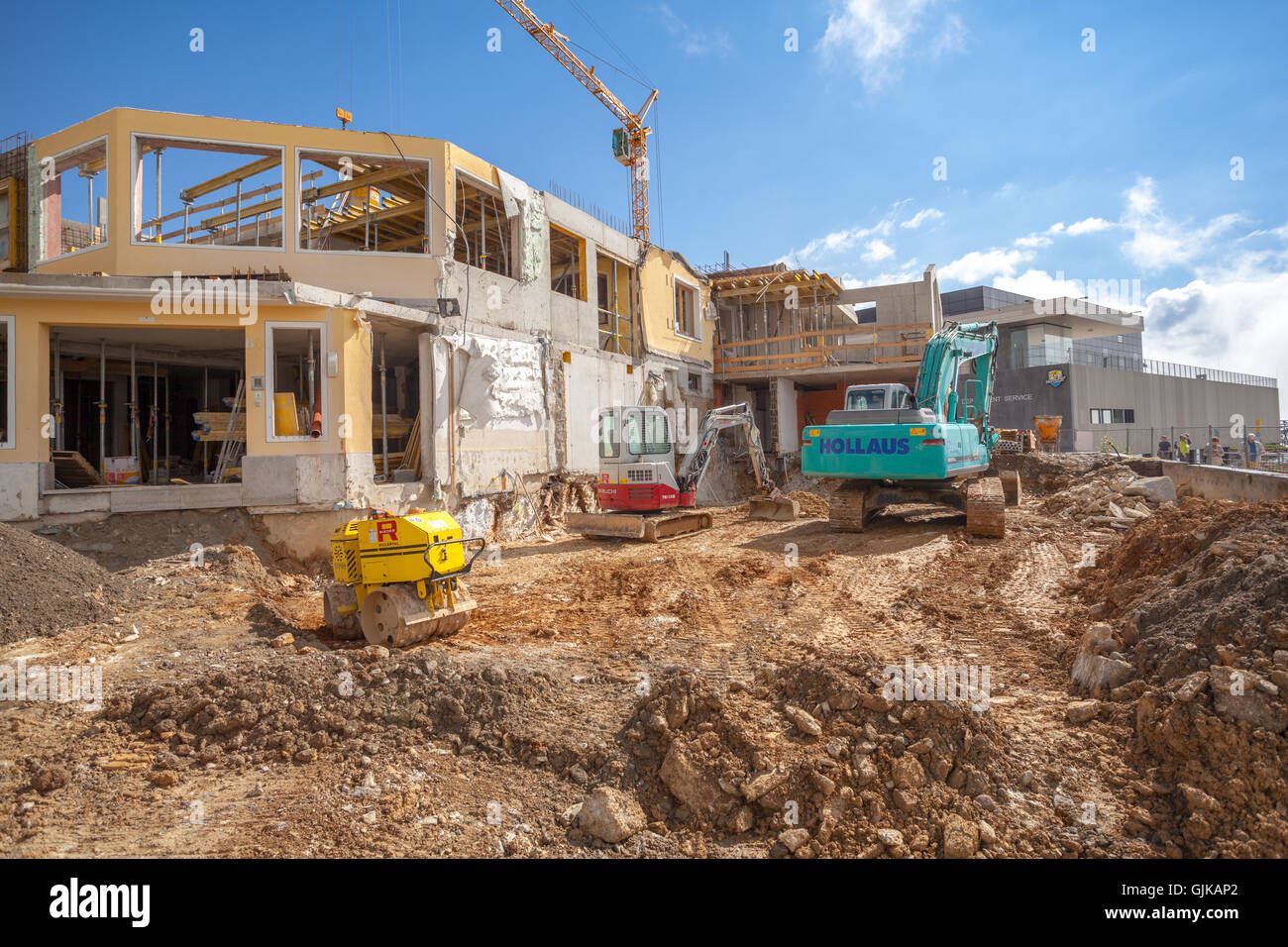 Costruzione di macchine su un sito in costruzione Foto Stock