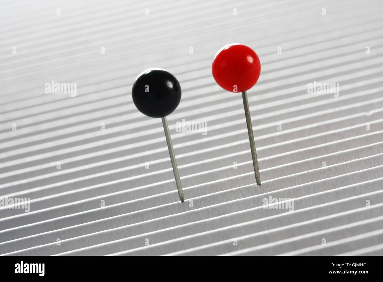 Aghi di moderazione in rosso e nero Foto Stock