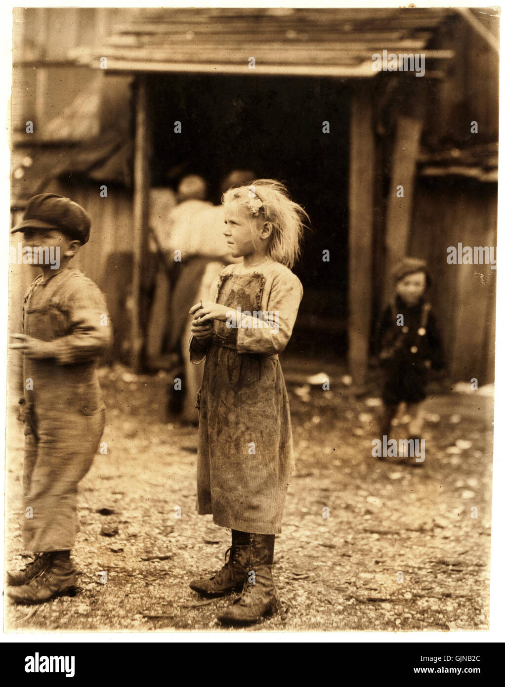 Lewis Hine, Bertha, sei anni shucker oyster, Port Royal, Carolina del Sud, 1912 Foto Stock