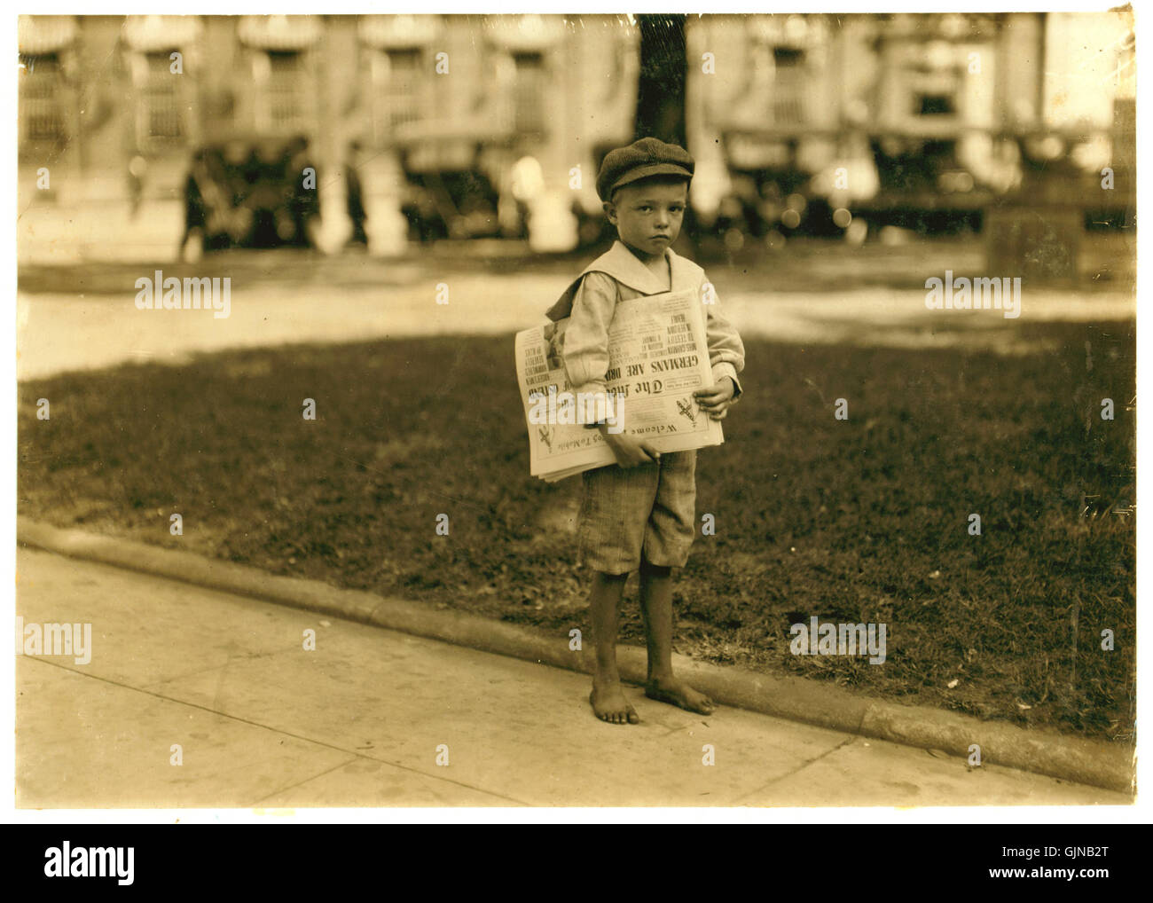 Lewis Hine, Ferris 7 anno vecchio newsie, Mobile, Alabama, 1914 Foto Stock