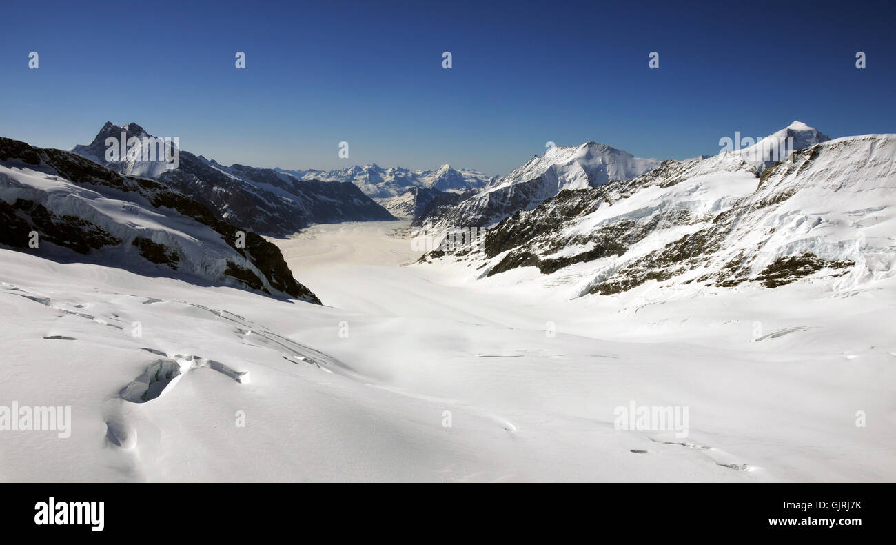 Lo scioglimento dei ghiacciai di neve crepacci Foto Stock