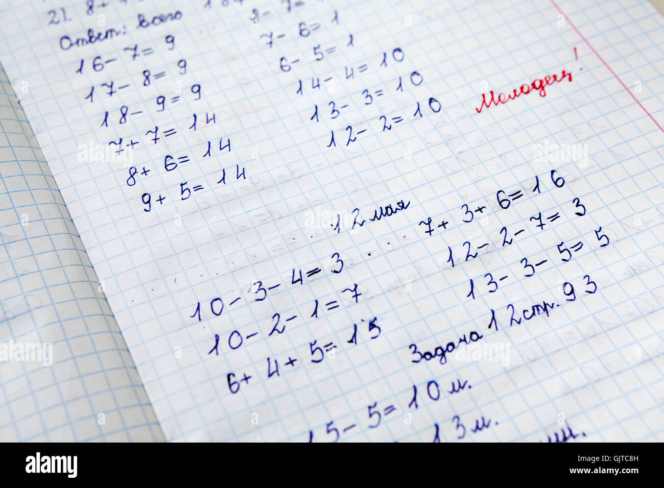 Foglio di appunti delle lezioni di matematica con parola dell'insegnante ben fatto! Foto Stock