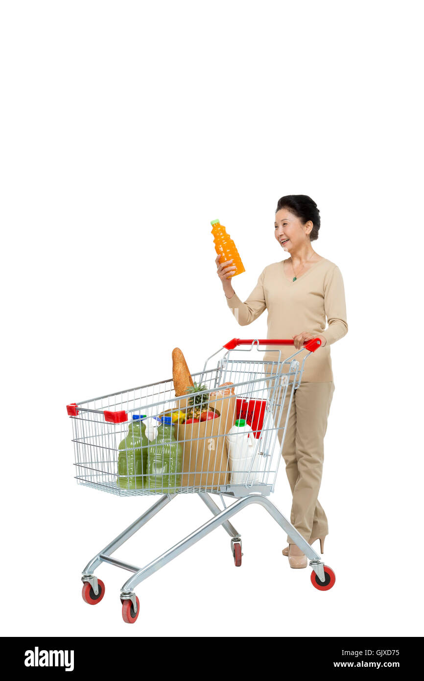 Studio shot vecchia donna shopping Foto Stock