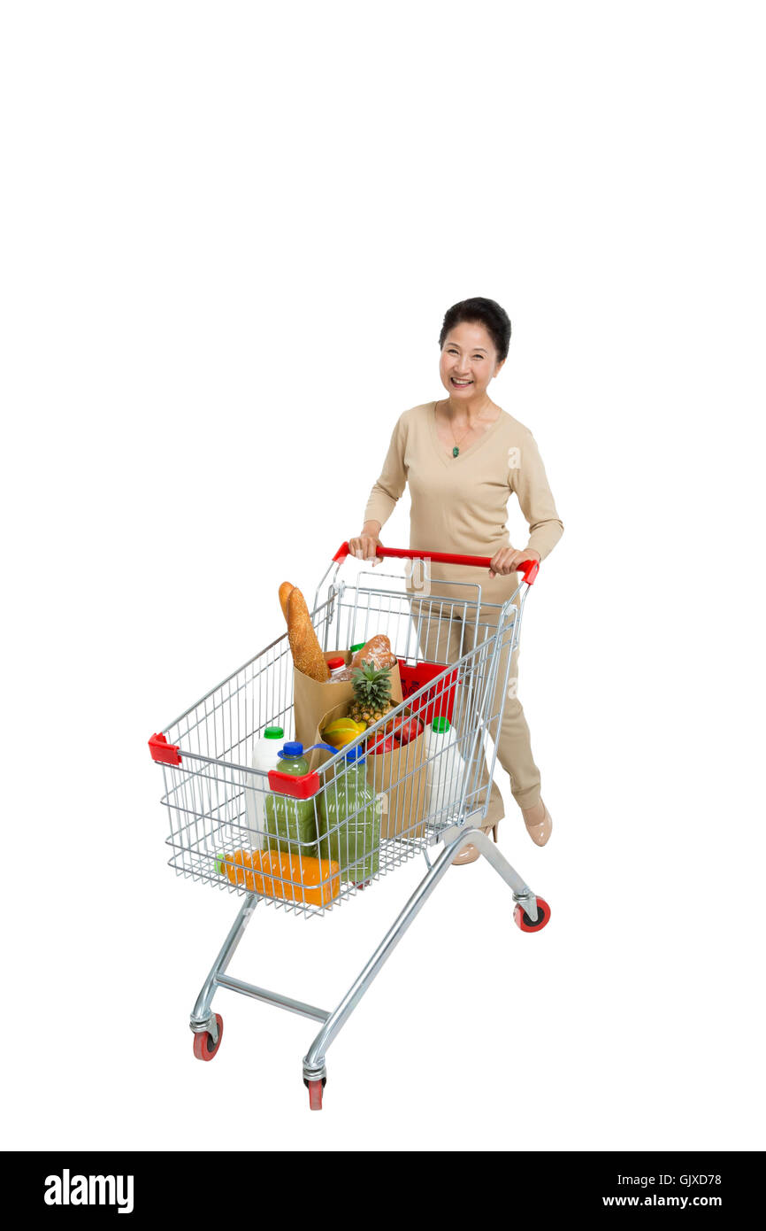 Studio shot vecchia donna shopping Foto Stock