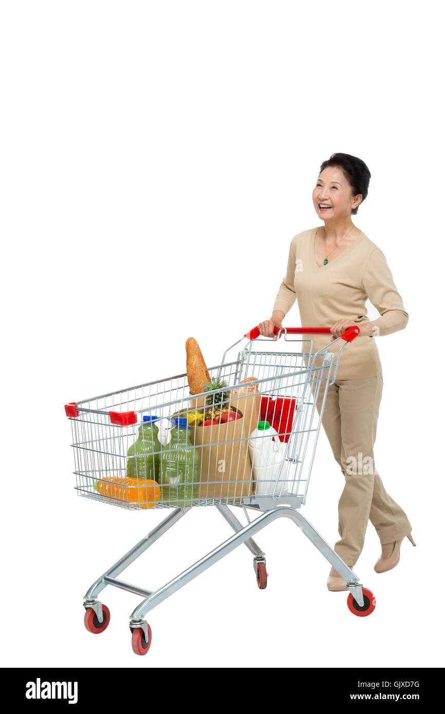 Studio shot vecchia donna shopping Foto Stock