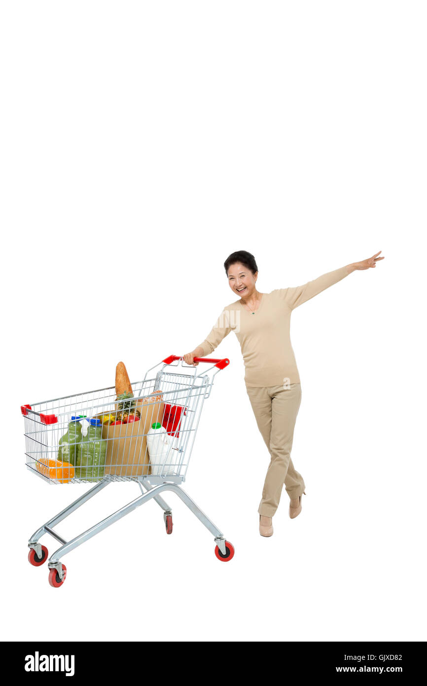 Studio shot vecchia donna shopping Foto Stock