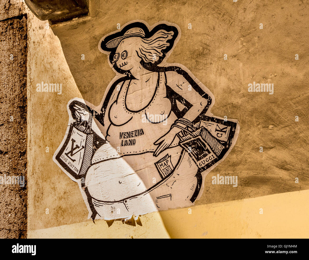 Venezia terra dall artista Guerrilla Spam. Turismo anti-graffiti, su una parete di un edificio a Venezia, Italia. Foto Stock