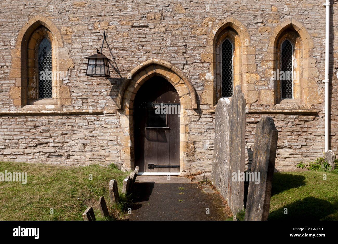 Porta sud del la Chiesa di Sant'Andrea Cleeve prima, Worcestershire, England, Regno Unito Foto Stock