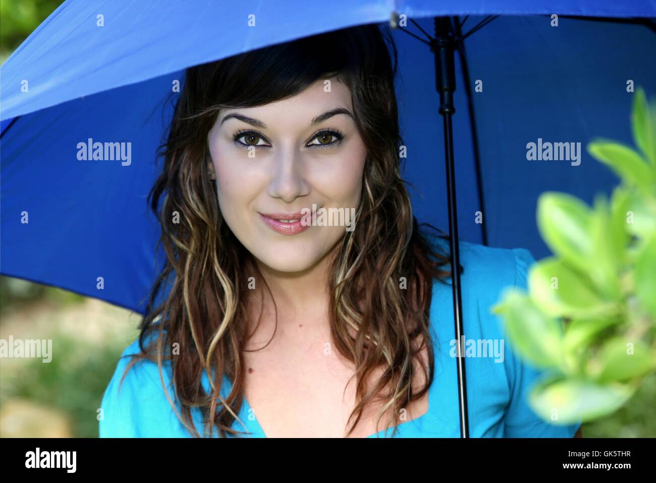 Bella ragazza con ombrello Foto Stock
