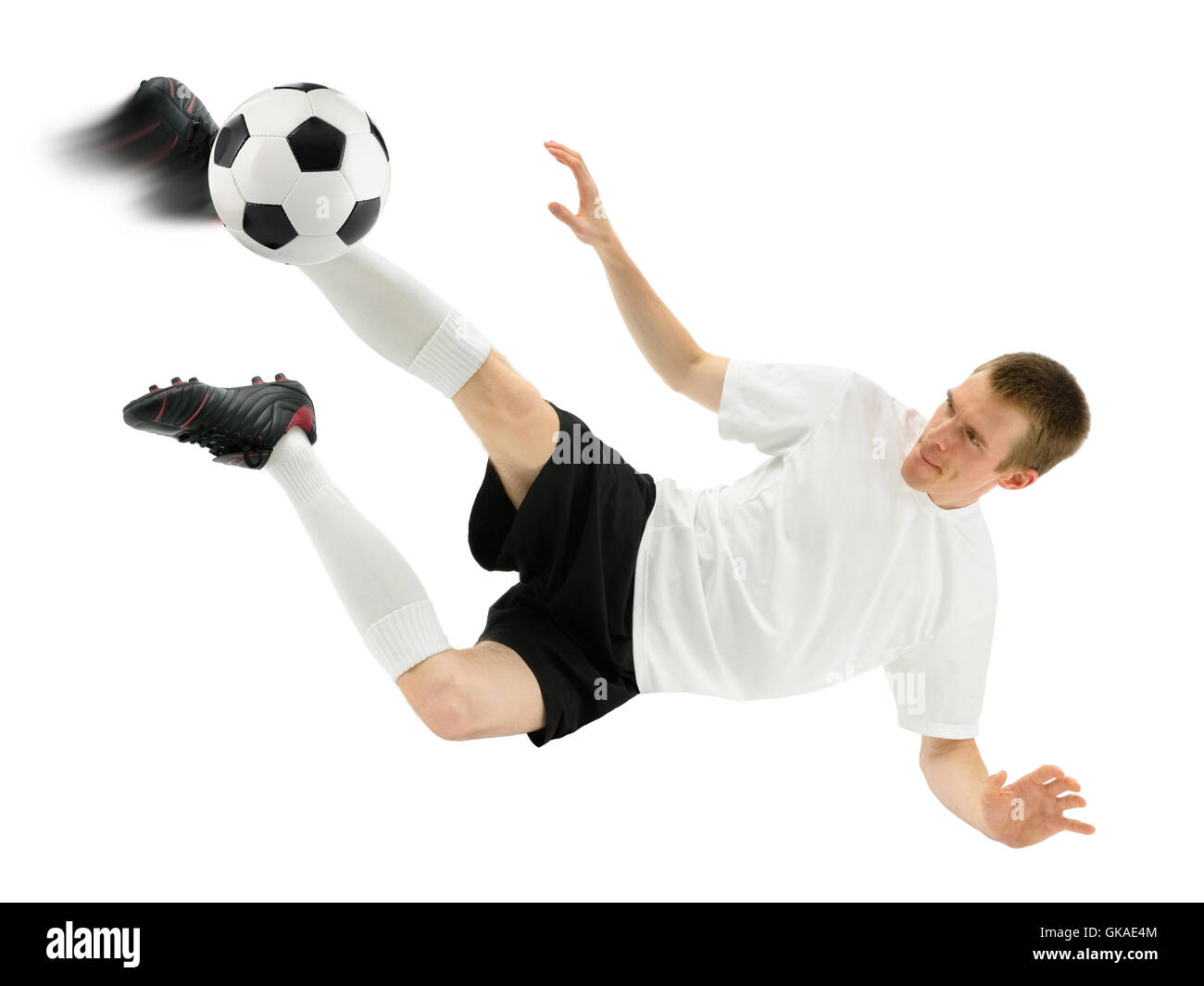 Il calciatore mostra un abile shot Foto Stock