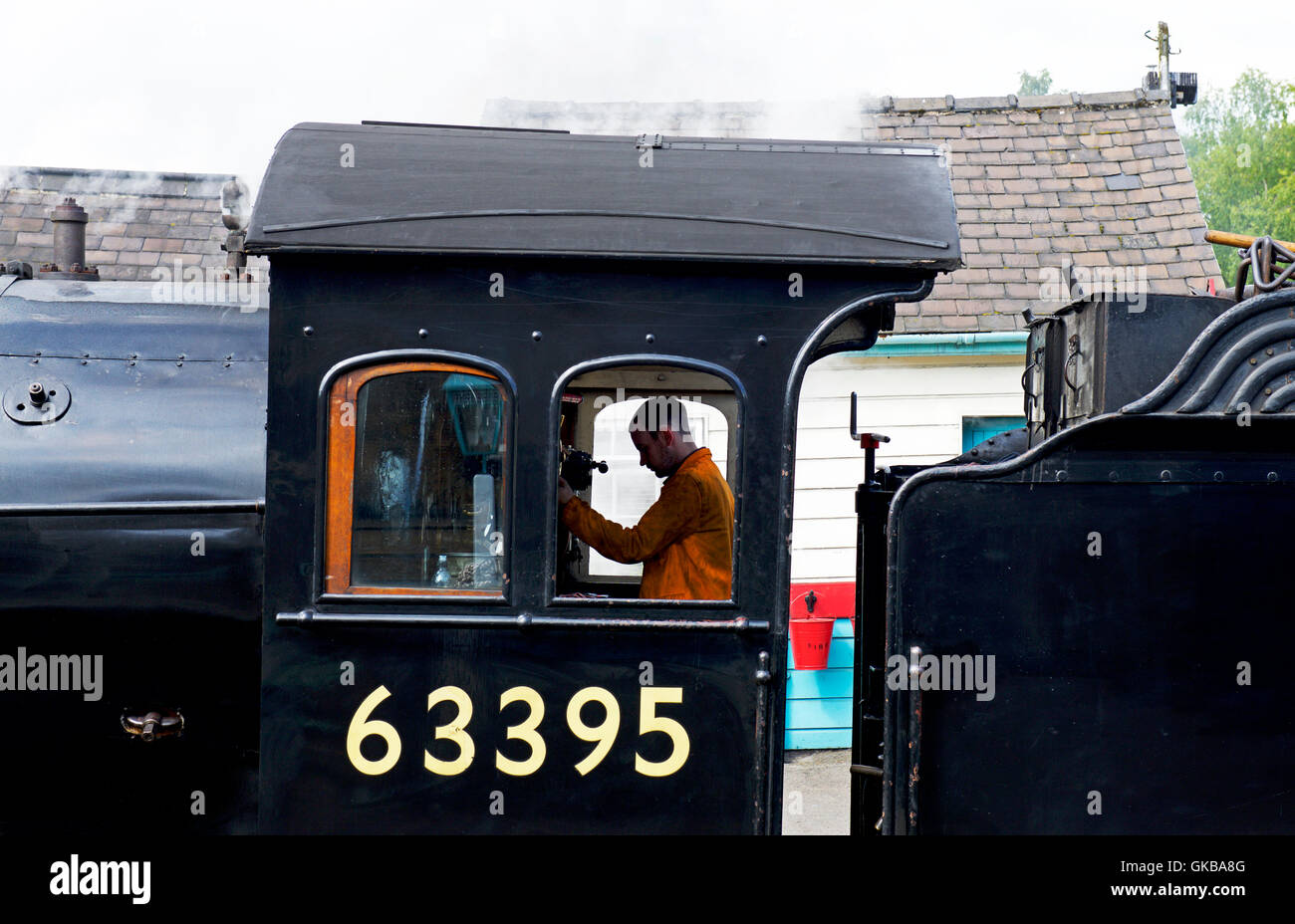 Motore a vapore a Grosmont stazione sulla North York Moors Steam Railway, North Yorkshire, Inghilterra, Regno Unito Foto Stock