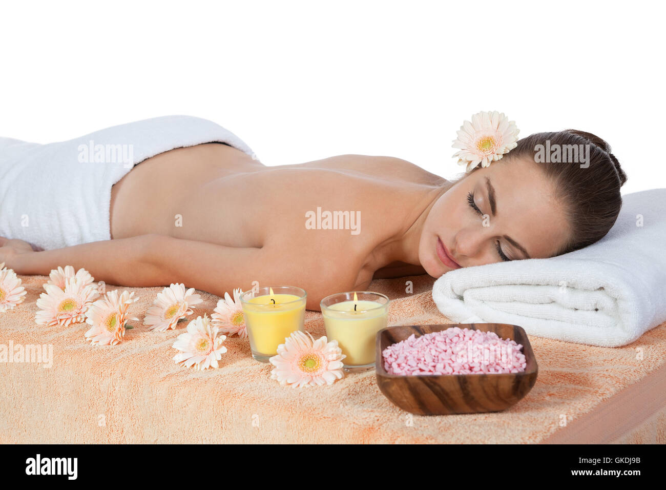 Giovane donna attraktve ottiene un massaggio hot stone Foto Stock