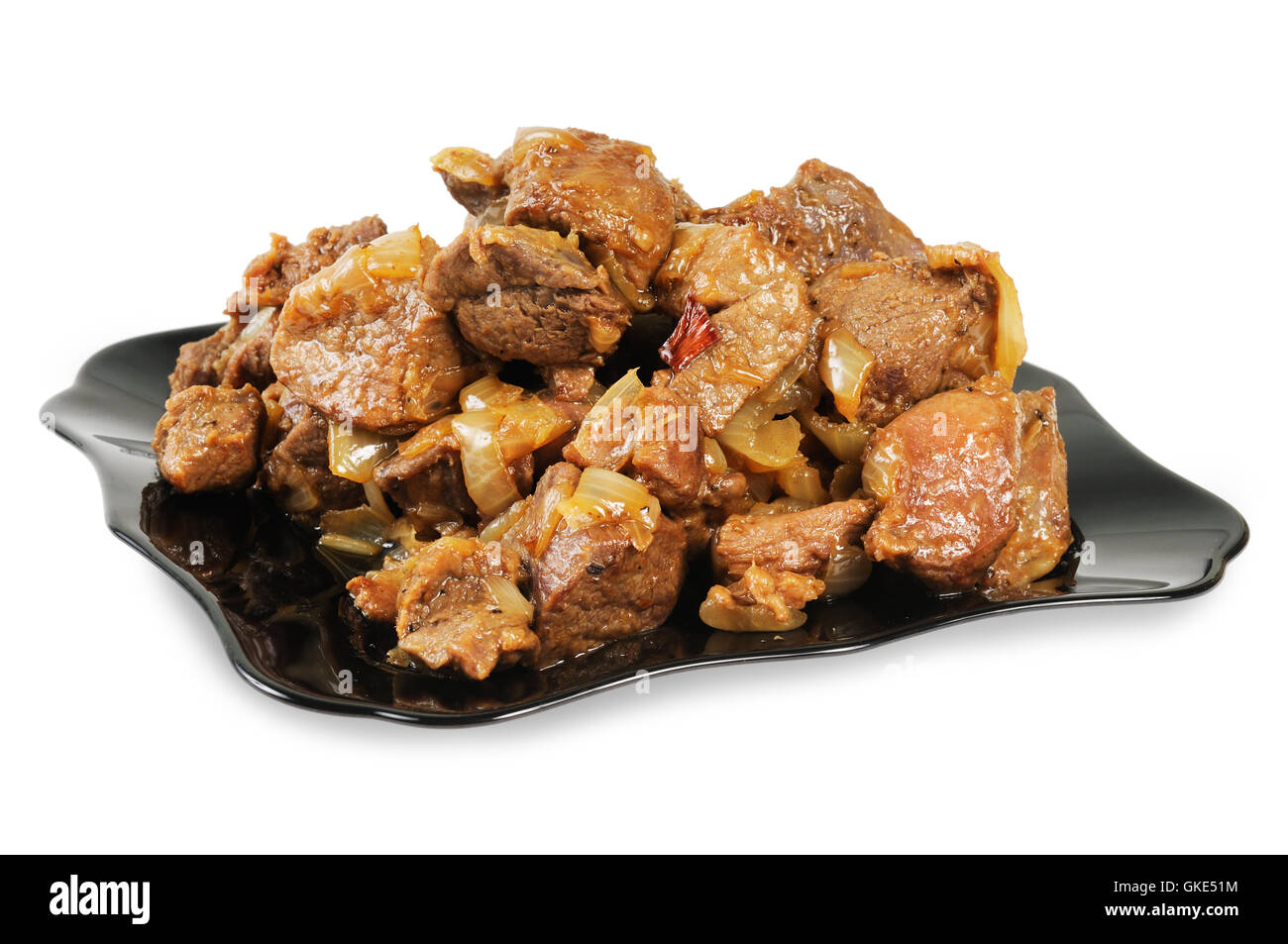 Stufato con cipolle su una piastra. Foto Stock