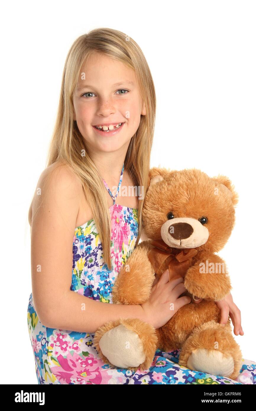 Bella ragazza con animali giocattolo Foto Stock