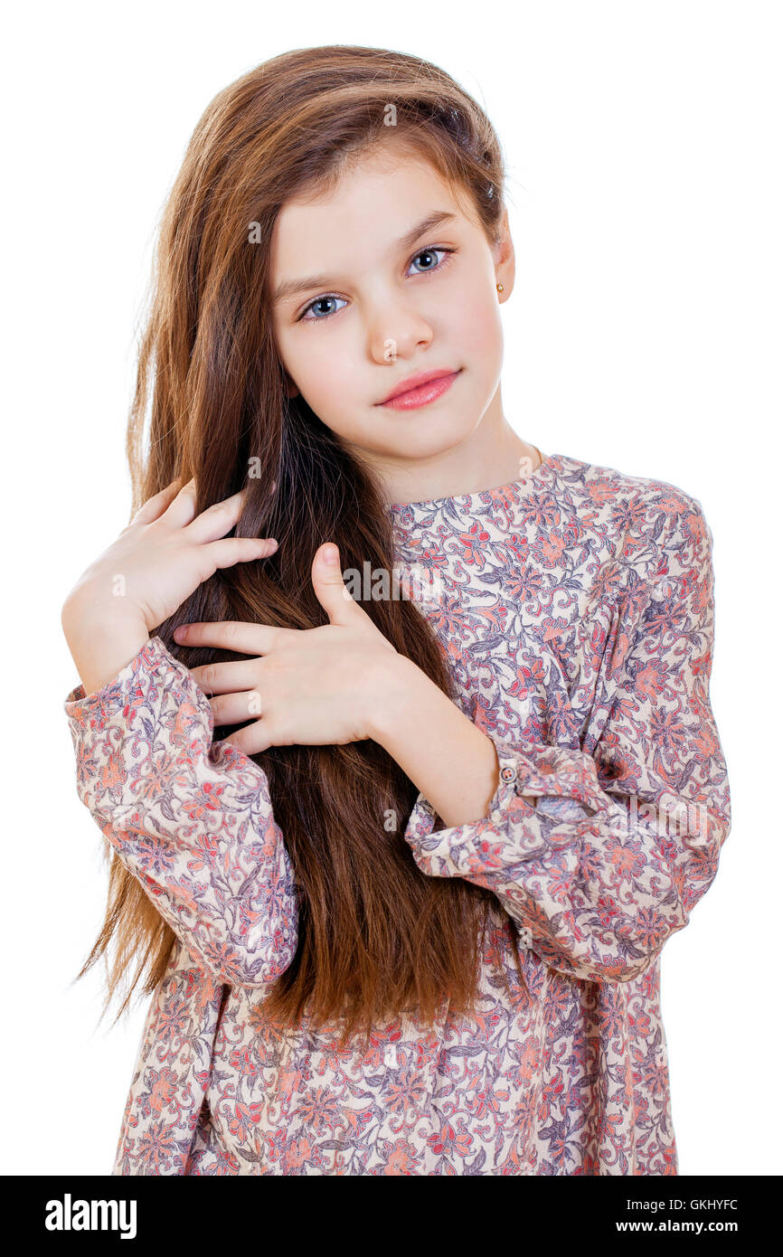 Triste bambina, isolato su sfondo bianco Foto Stock