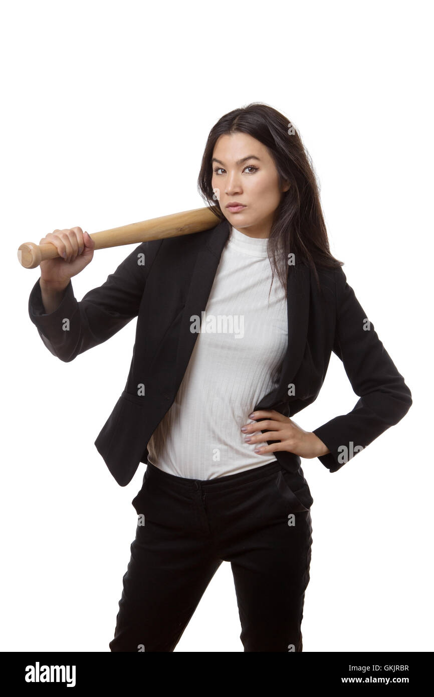 Business donna brandendo una base ball bat cercando media e forte Foto Stock