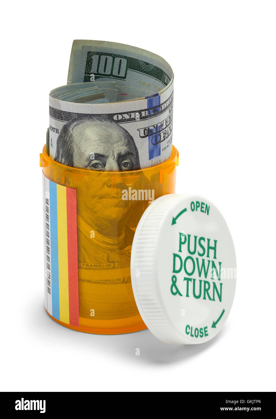 Pillola bottiglia con centinaia di dollari isolati su sfondo bianco. Foto Stock