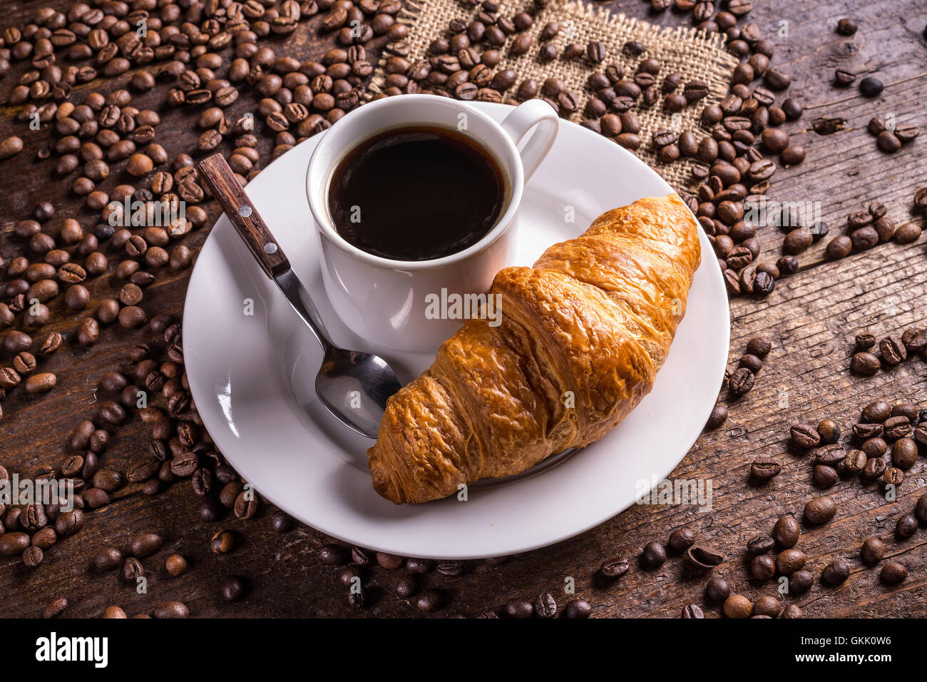Caffè e croissant Foto Stock