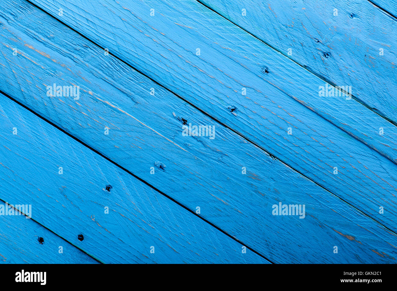 Blue parallelo di tavole di legno con fori Foto Stock