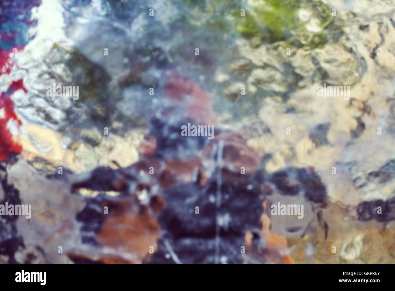 Sfocato sfondo astratta fatta di superficie irregolare. Foto Stock