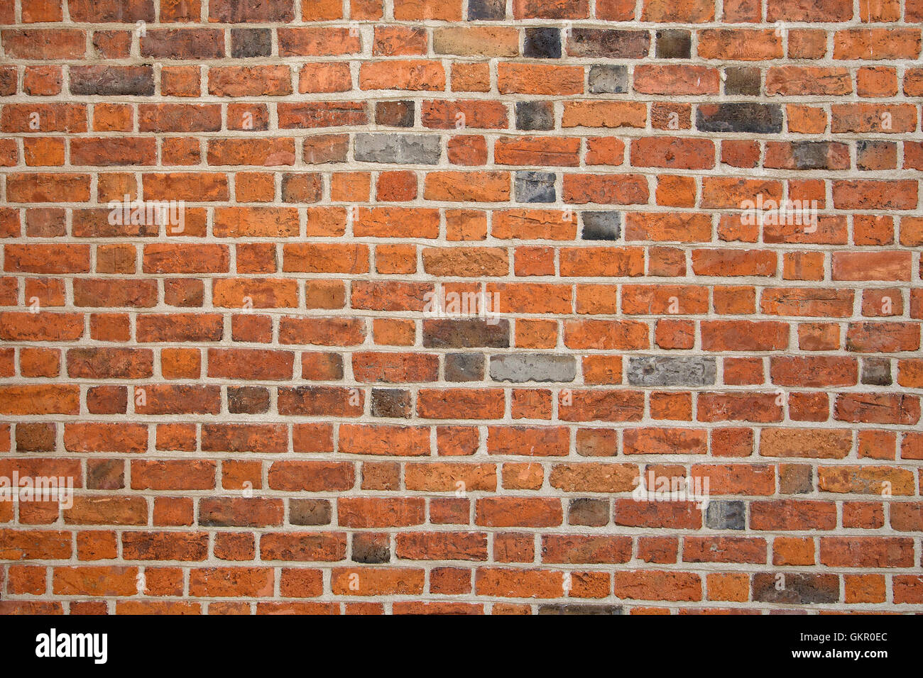 Un muro di mattoni, uno sfondo o texture Foto Stock