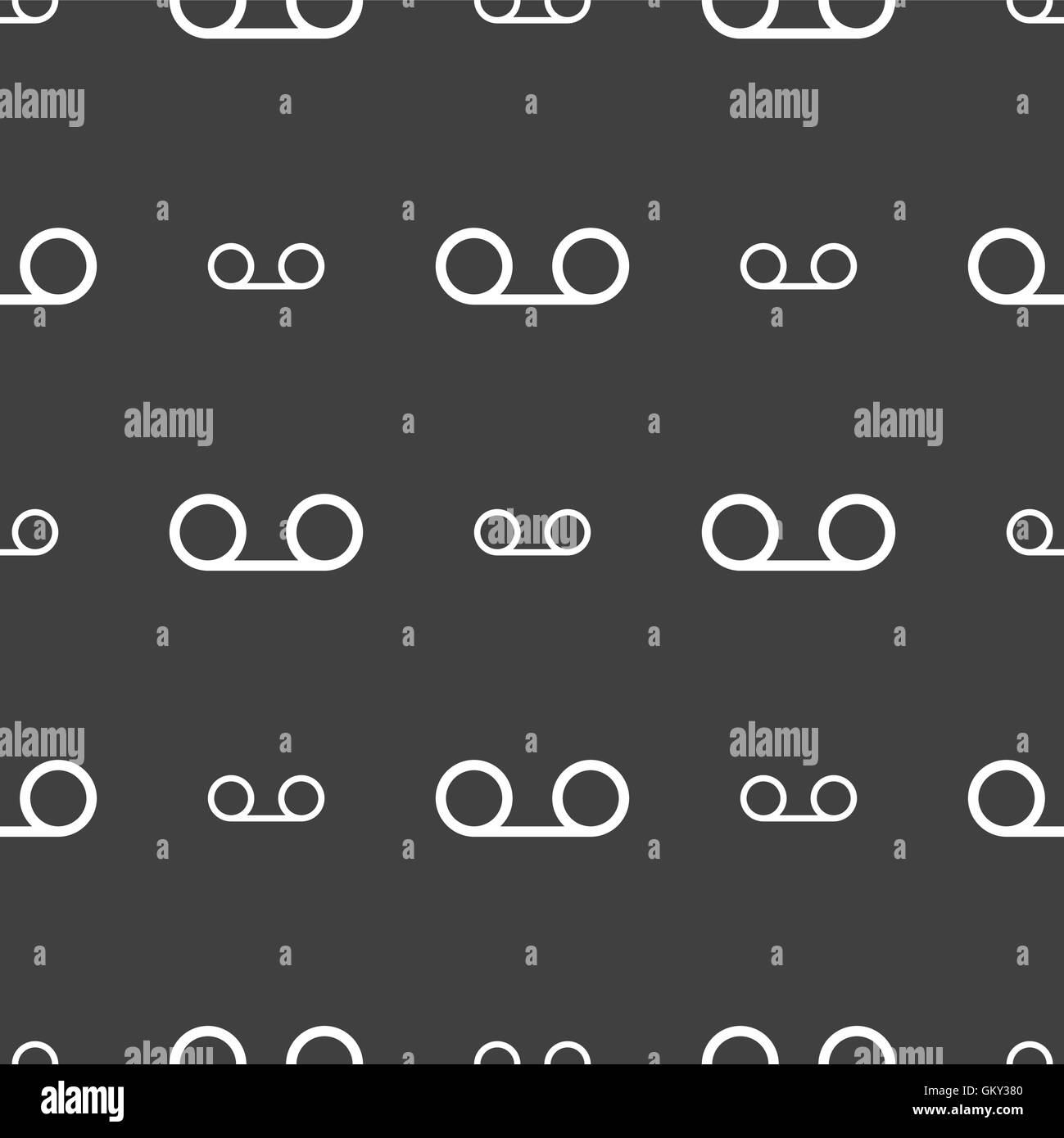 Cassetta audio icona segno. Seamless pattern su uno sfondo grigio. Vettore Illustrazione Vettoriale