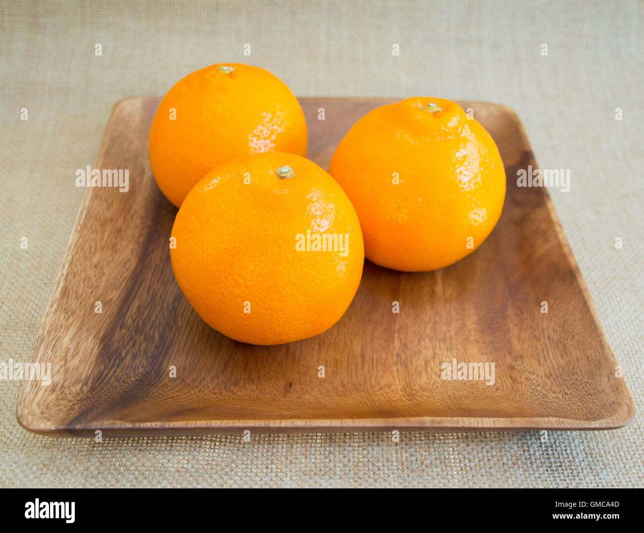 Tre arance Foto Stock