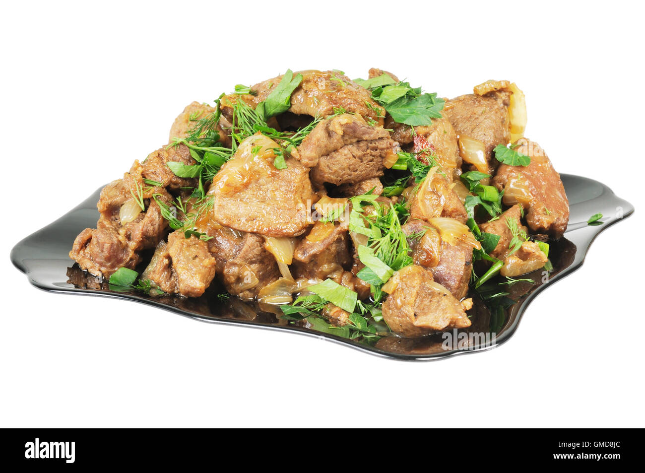 Stufato con cipolle su una piastra. Foto Stock