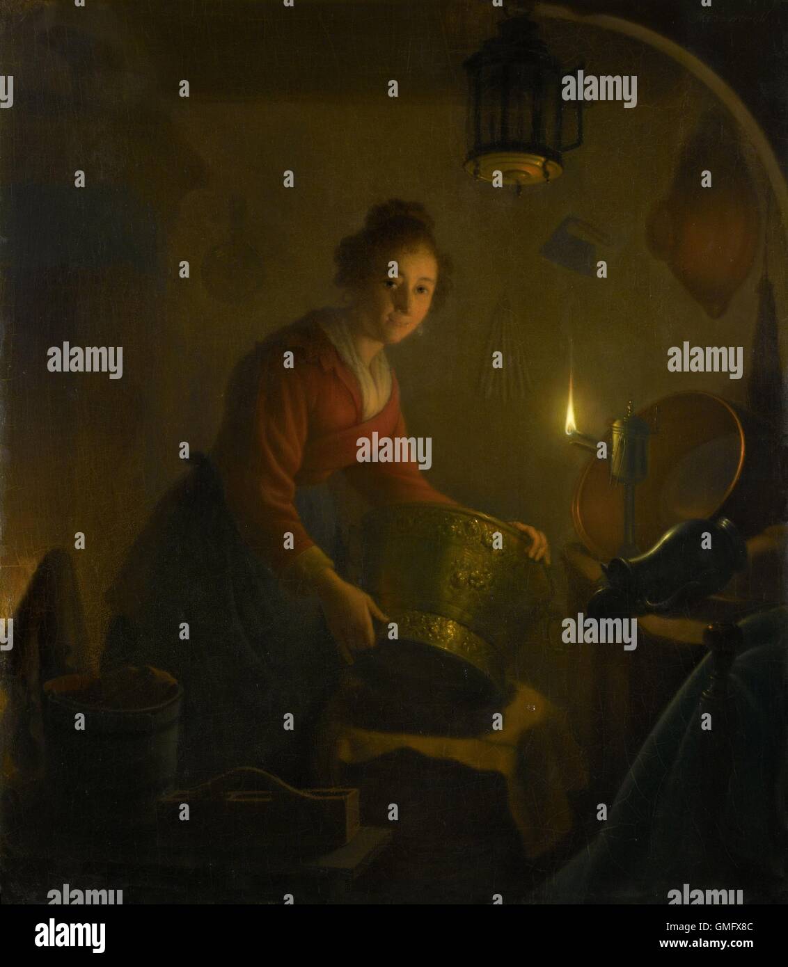 Una donna in una cucina a lume di candela, da Michiel Versteegh, c. 1830, pittura olandese, olio su pannello. Ella è la manipolazione di grandi vasi di metallo mediante la luce di una lampada ad olio (BSLOC 2016 2 171) Foto Stock