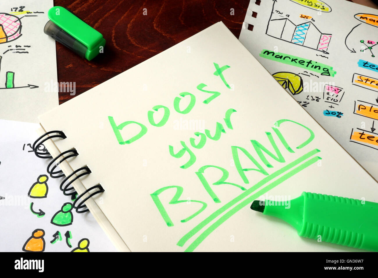 Segno aumenta il tuo brand in un notebook. Foto Stock