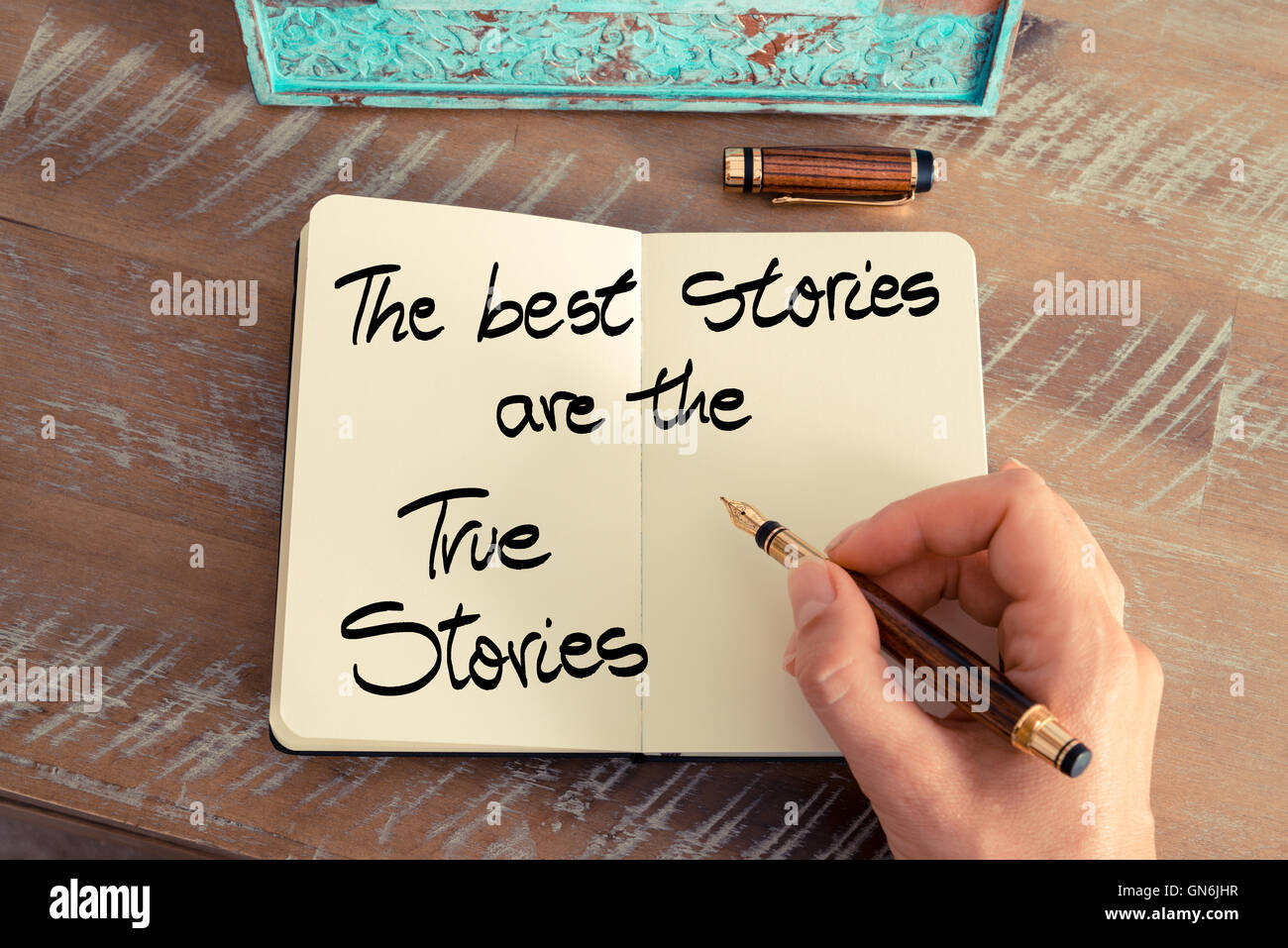 Il testo scritto a mano le migliori storie sono le storie vere come immagine aziendale. Foto Stock