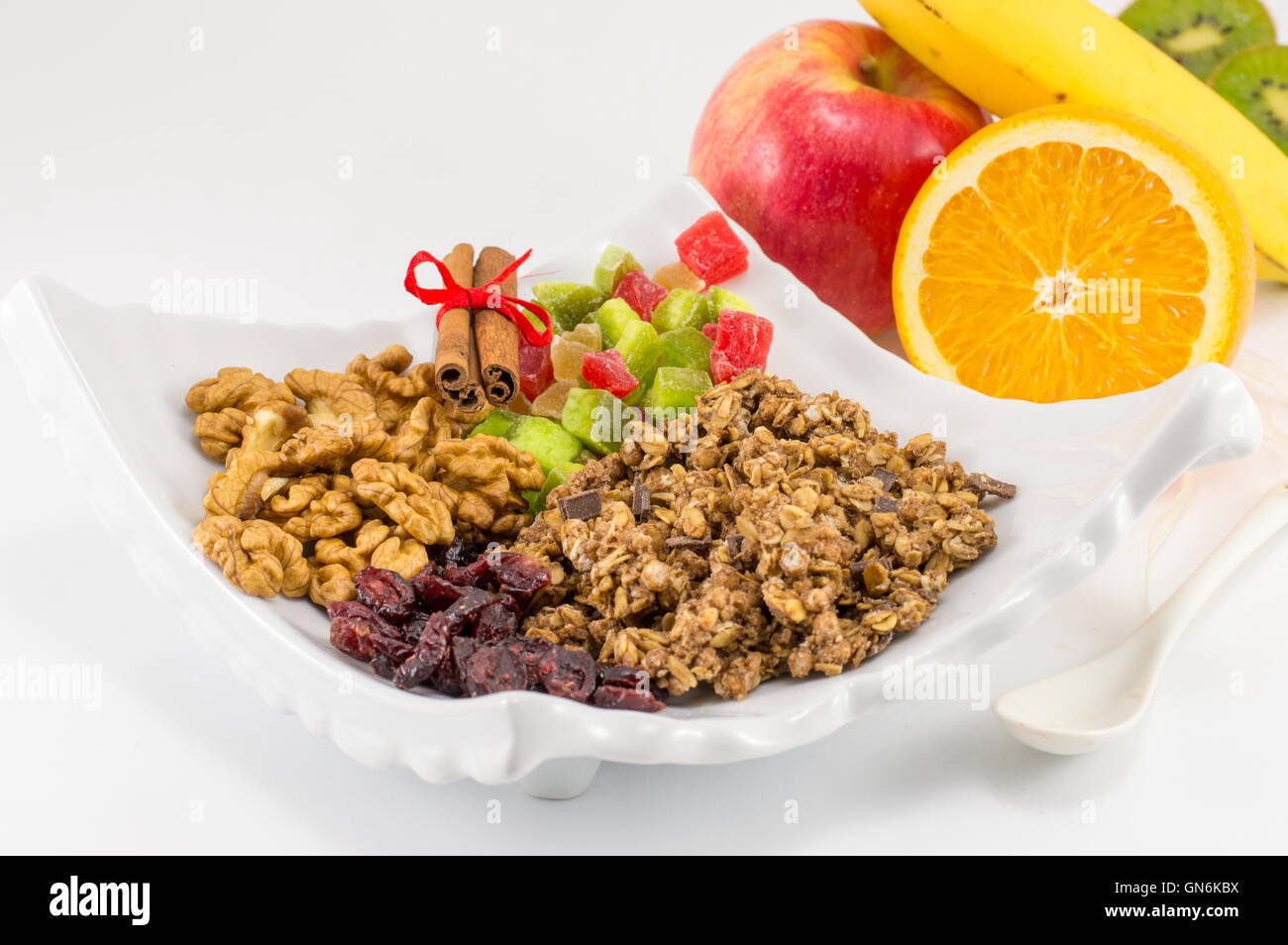 Granola muesli con frutta ingredienti per una sana prima colazione Foto Stock